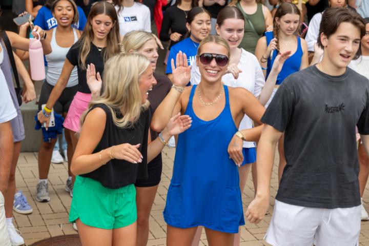 Student laughing in a group