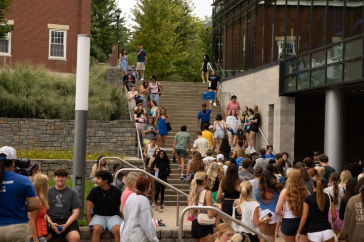 Students being lead to major sessions